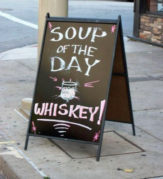 Доска возле бара: Суп дня - виски!