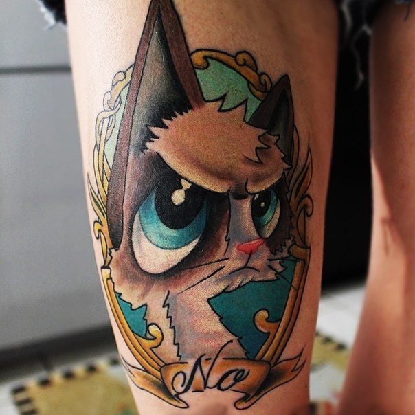 Татуировки со знаменитой Grumpy Cat