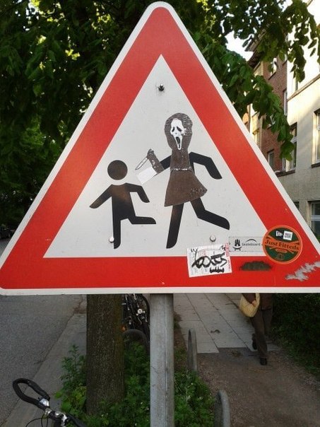 Подборка стрит-арта с дорожными знаками