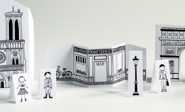 Бумажный Париж, который помещается в коробочку от конфет.