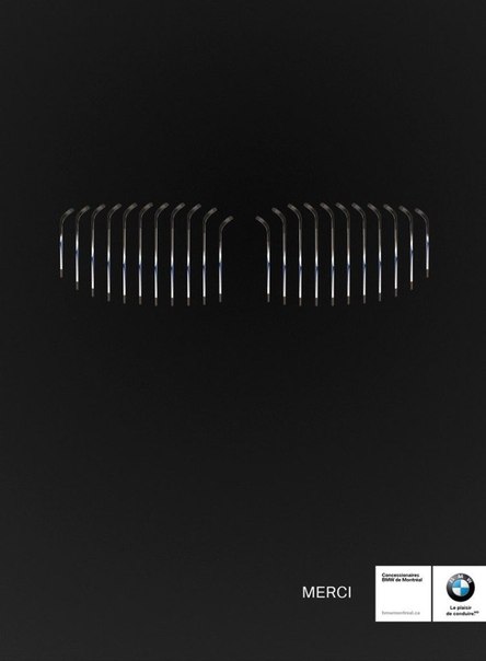 Постер BMW для канадского рынка. Узнаваемая решетка радиатора сложена из хоккейных клюшек.