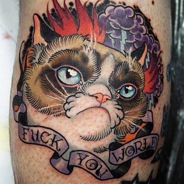Татуировки со знаменитой Grumpy Cat