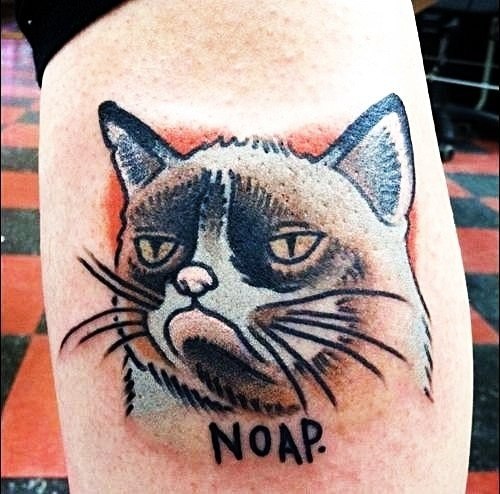 Татуировки со знаменитой Grumpy Cat