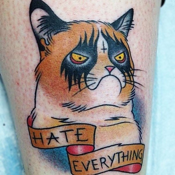 Татуировки со знаменитой Grumpy Cat